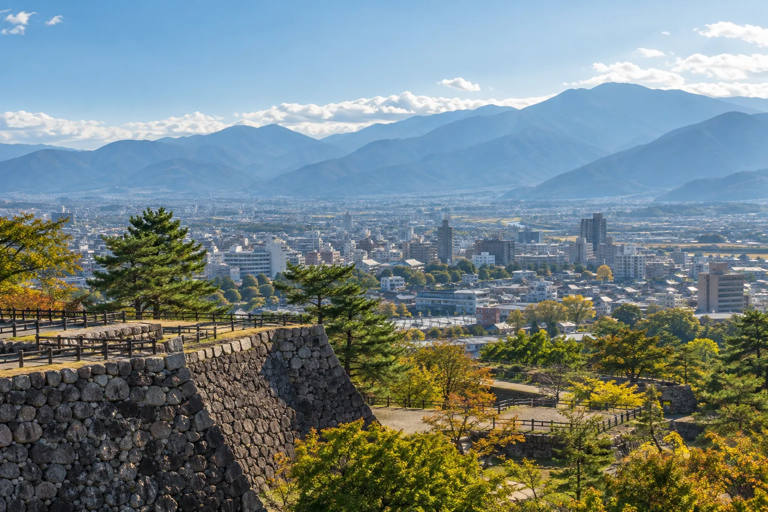 甲府盆地の街並みと山並み、城跡の石垣をイメージした生成画像